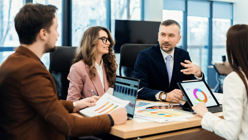 Business leaders in a strategy meeting at a conference table