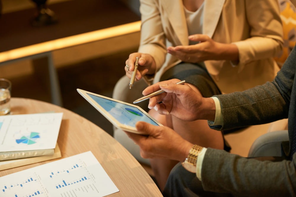 Advisors mapping how a client business runs on a planning board